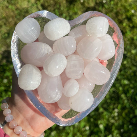 pink mangano calcite crystal tumbled stones